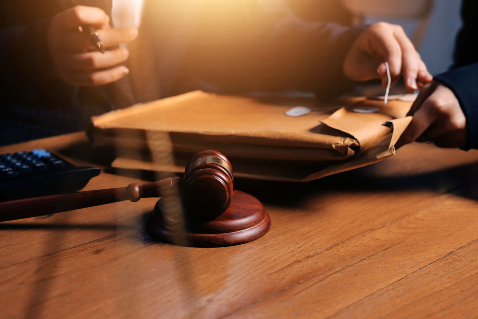 Gavel on table with legal documents